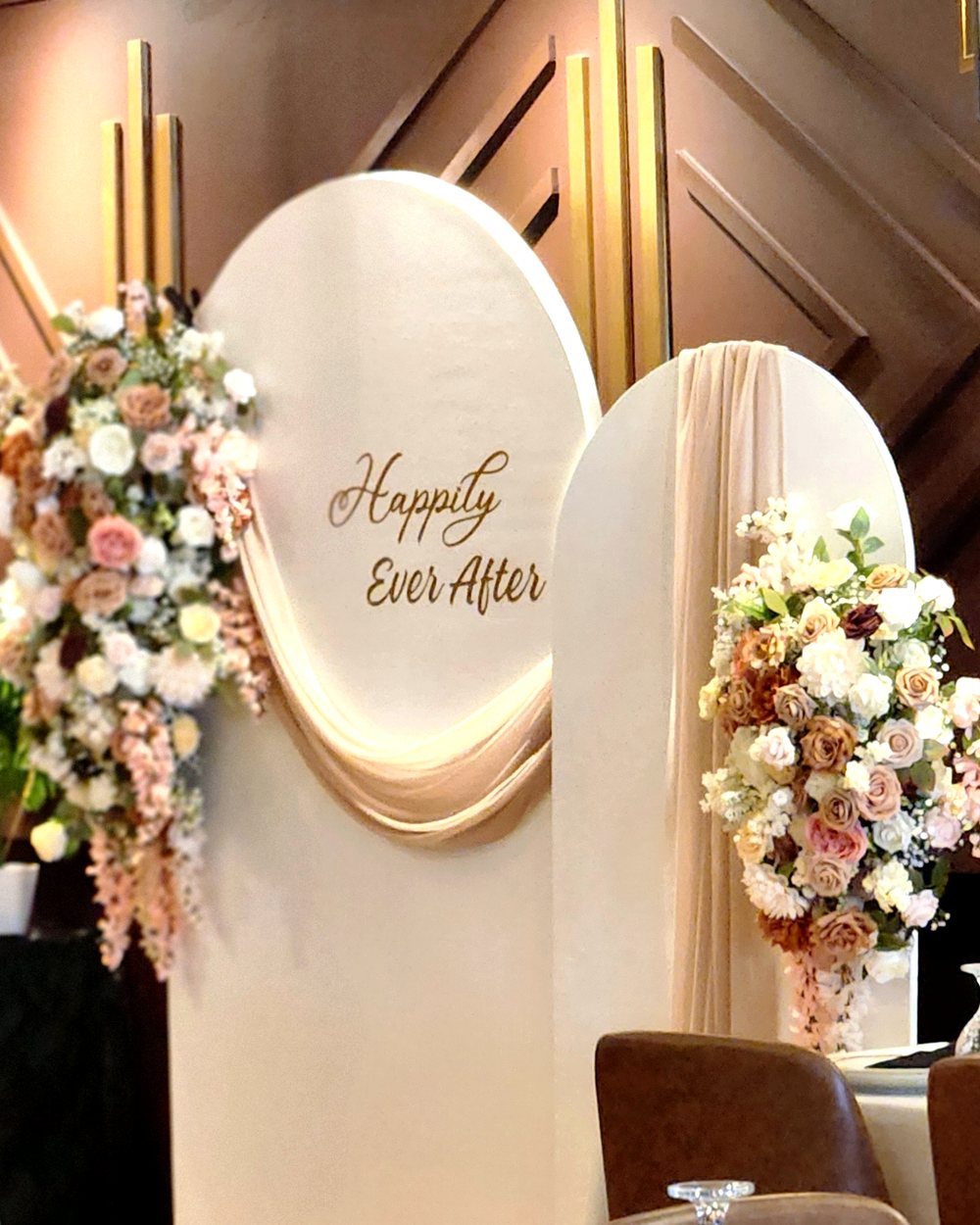 Elegant balloon and floral installation by EZone Rentals & Decor